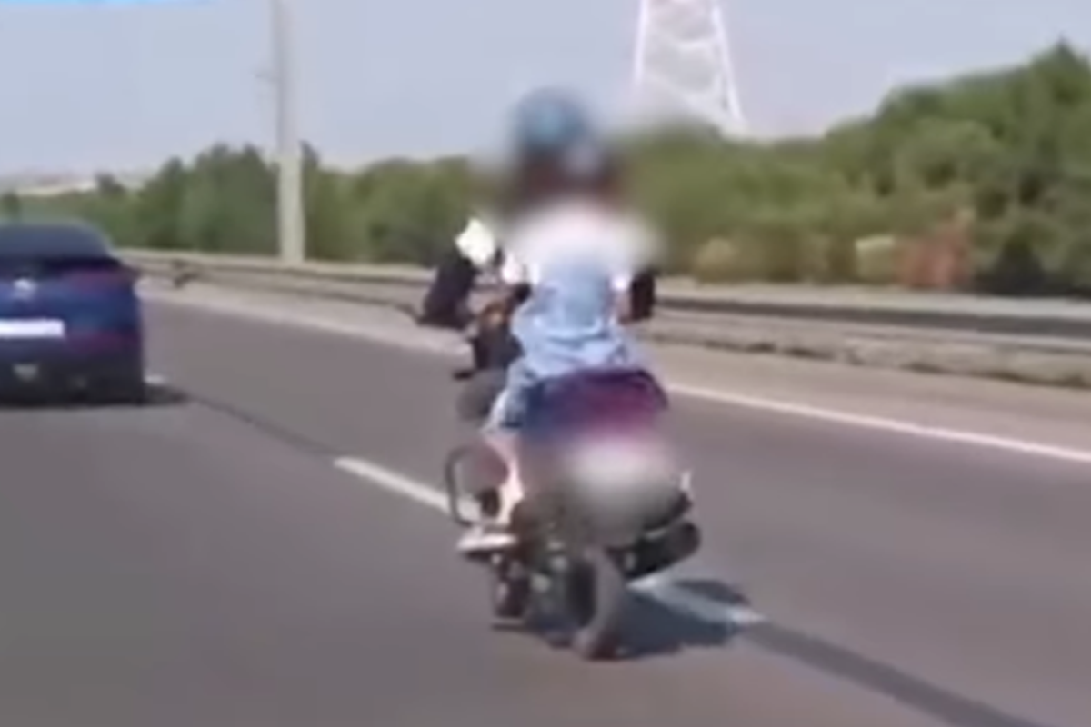 Bakıda övladını təhlükəli şəkildə daşıyan motosiklet sürücüsü saxlanıldı