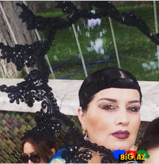 Elzanın başına əndrəbadi əşya