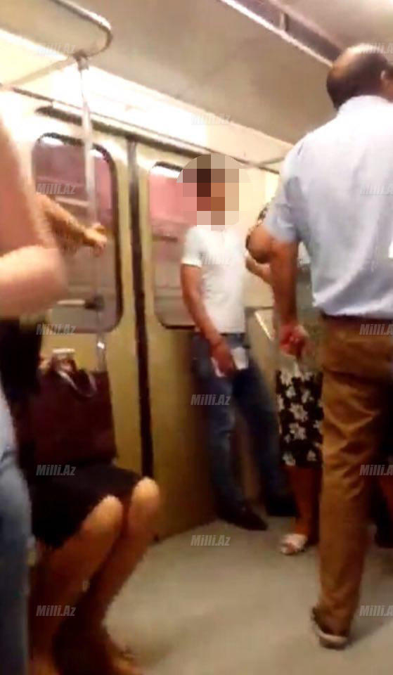 Bakıda metroda dava: oğlan söyüş söyən qadına şillə vurdu - FOTO